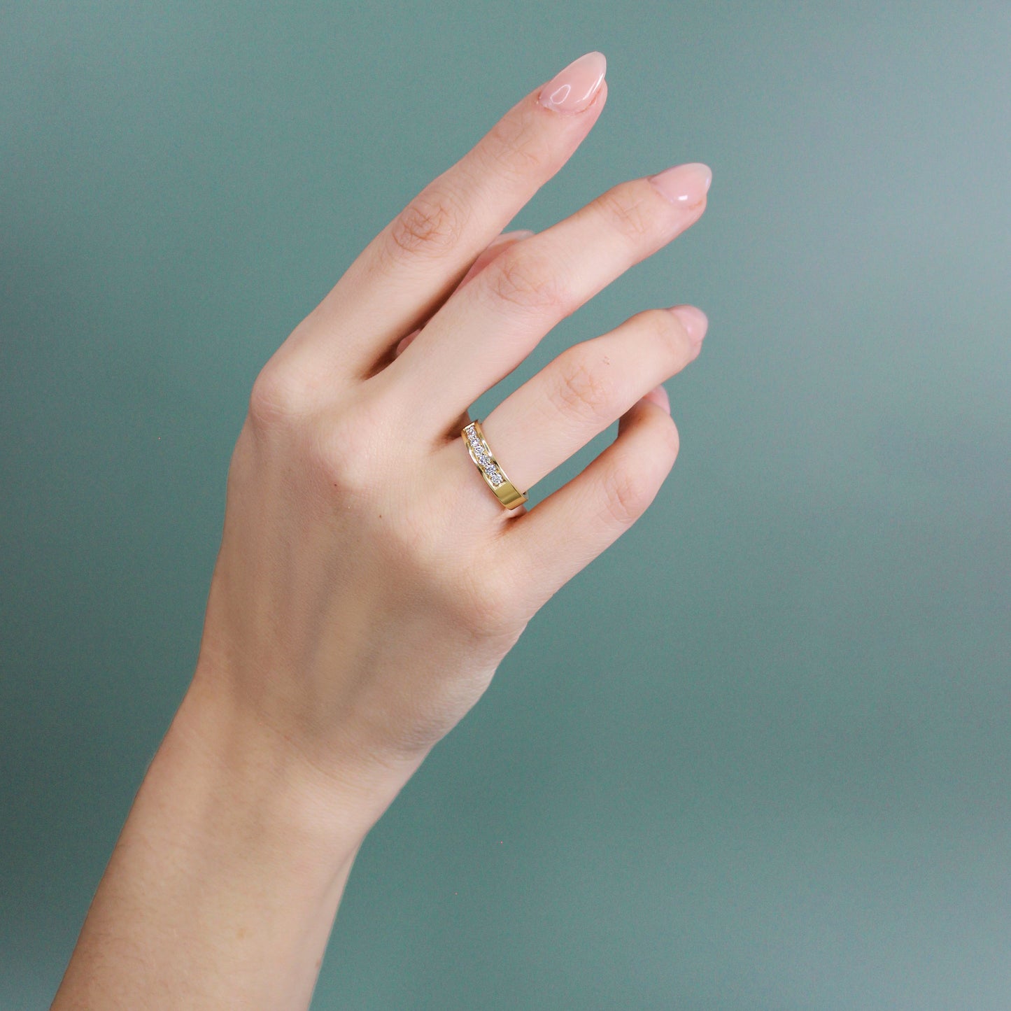 Model wears Standard Flat Band / 6mm Bright Cut Lab Diamonds on ring finger