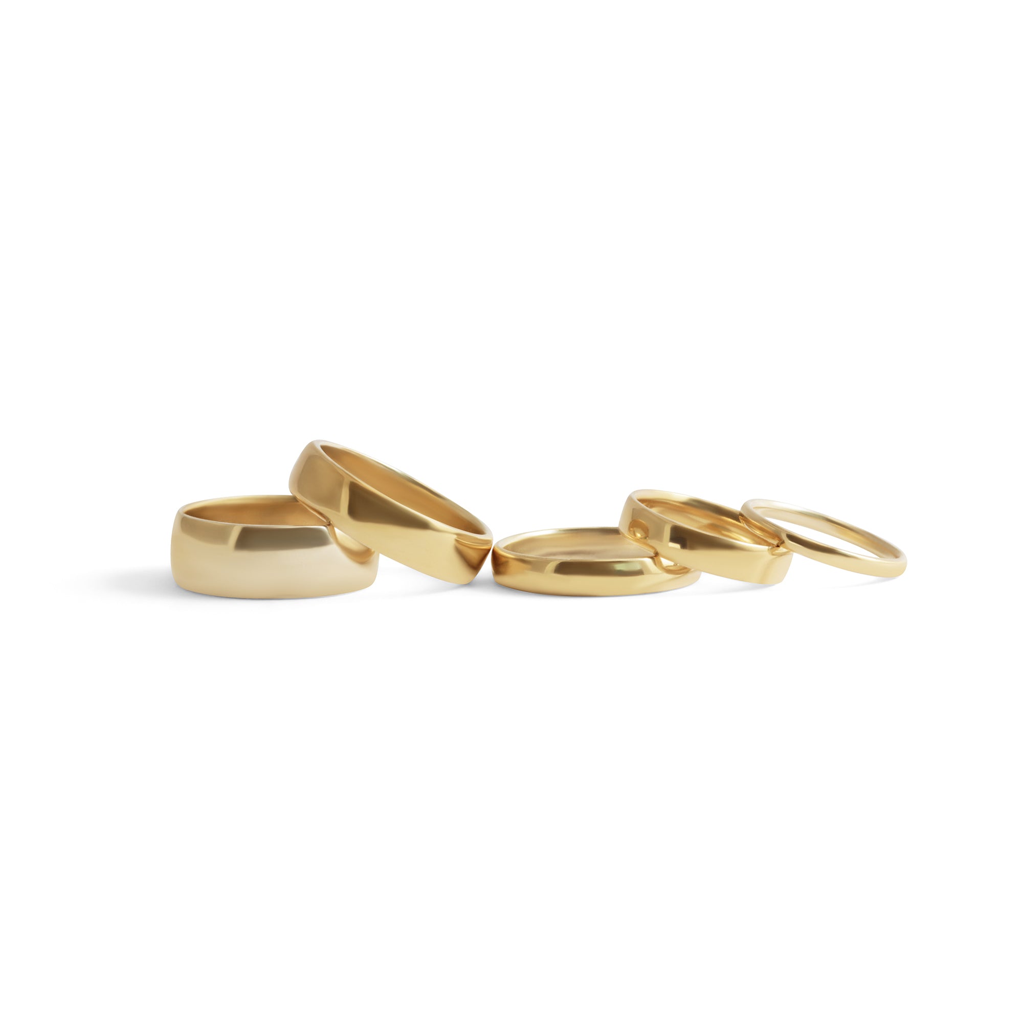 Stacked view of 14k Yellow Gold Dome Bands in various widths