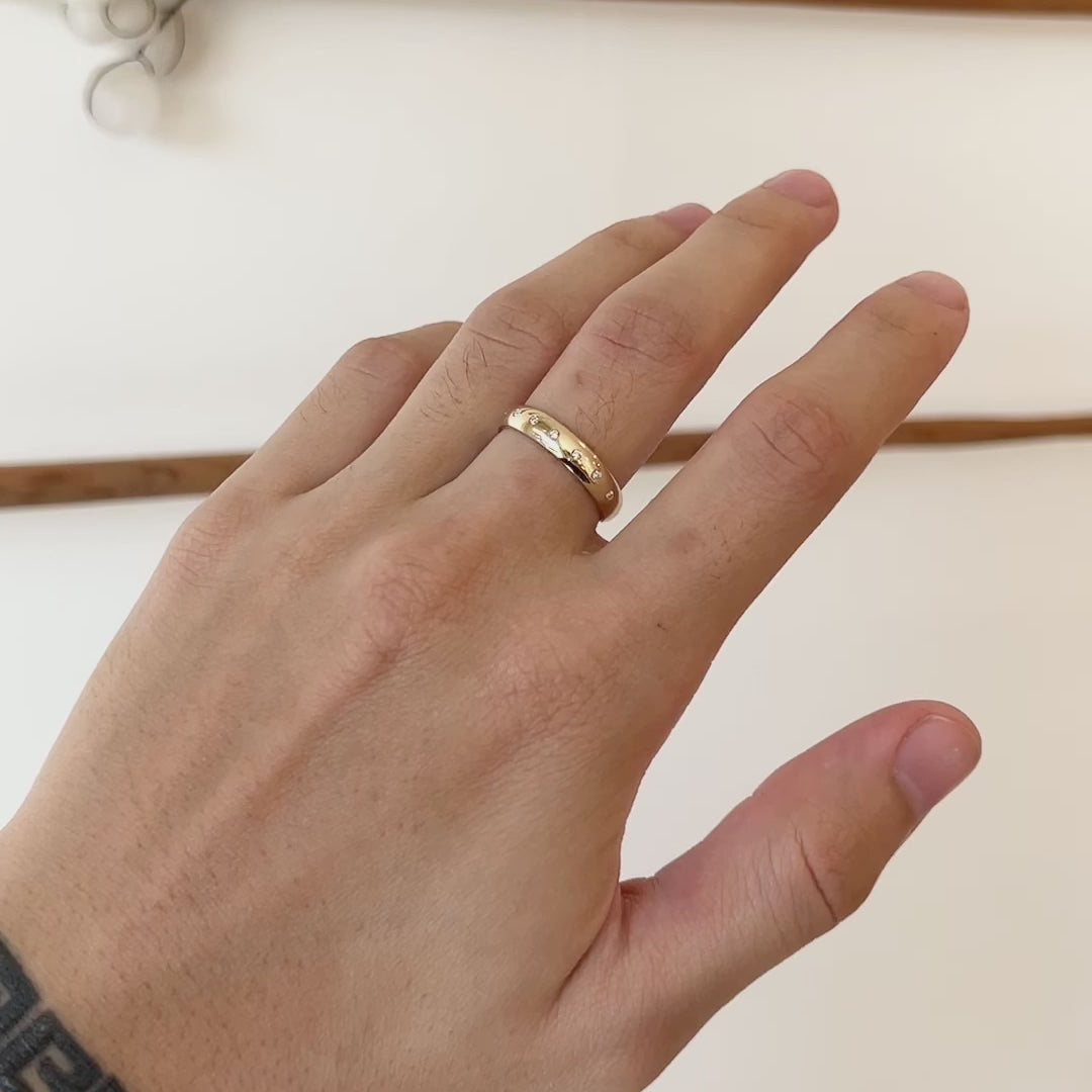 Model wearing Standard Dome Band / Flush Lab Diamonds on middle finger showing different angles of ring