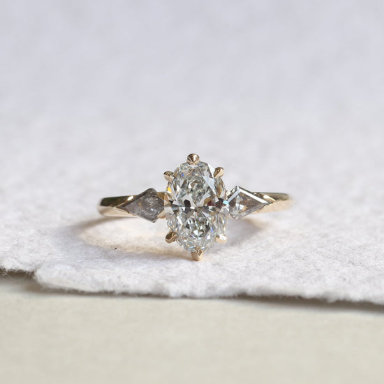 Front view of Colette + Drew's custom engagement ring by Goldpoint Jewelry in Greenpoint, Brooklyn.