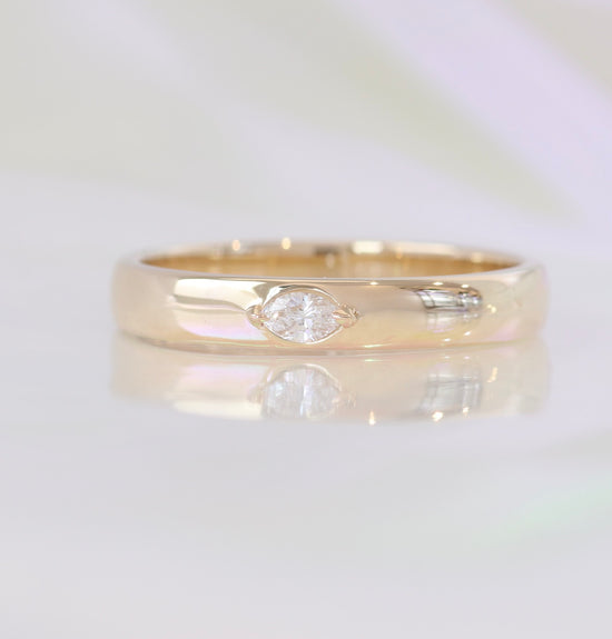 Customized wedding band from our Horus Collection.