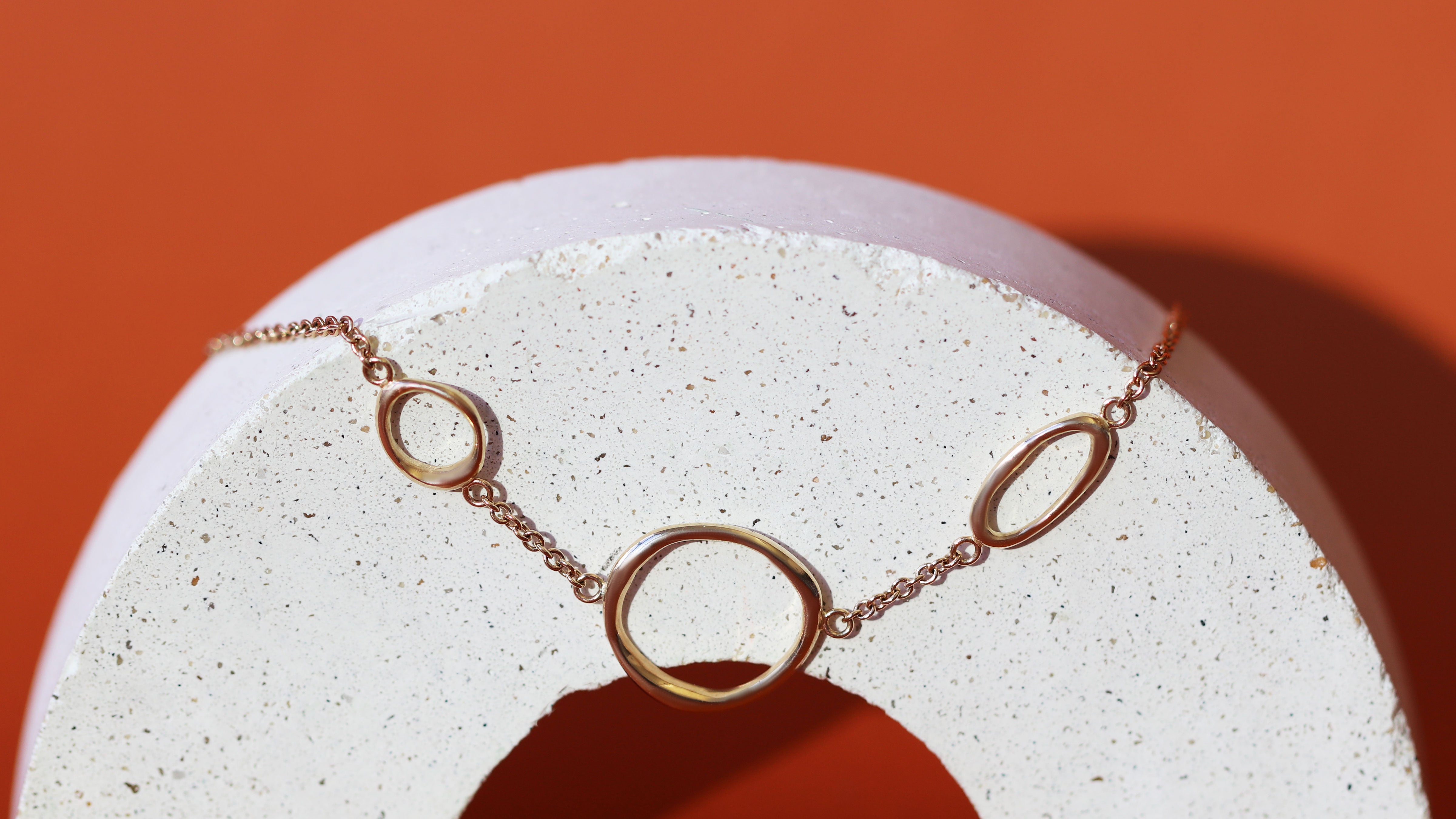 Artistic view of the Amorphous Charm Bracelet