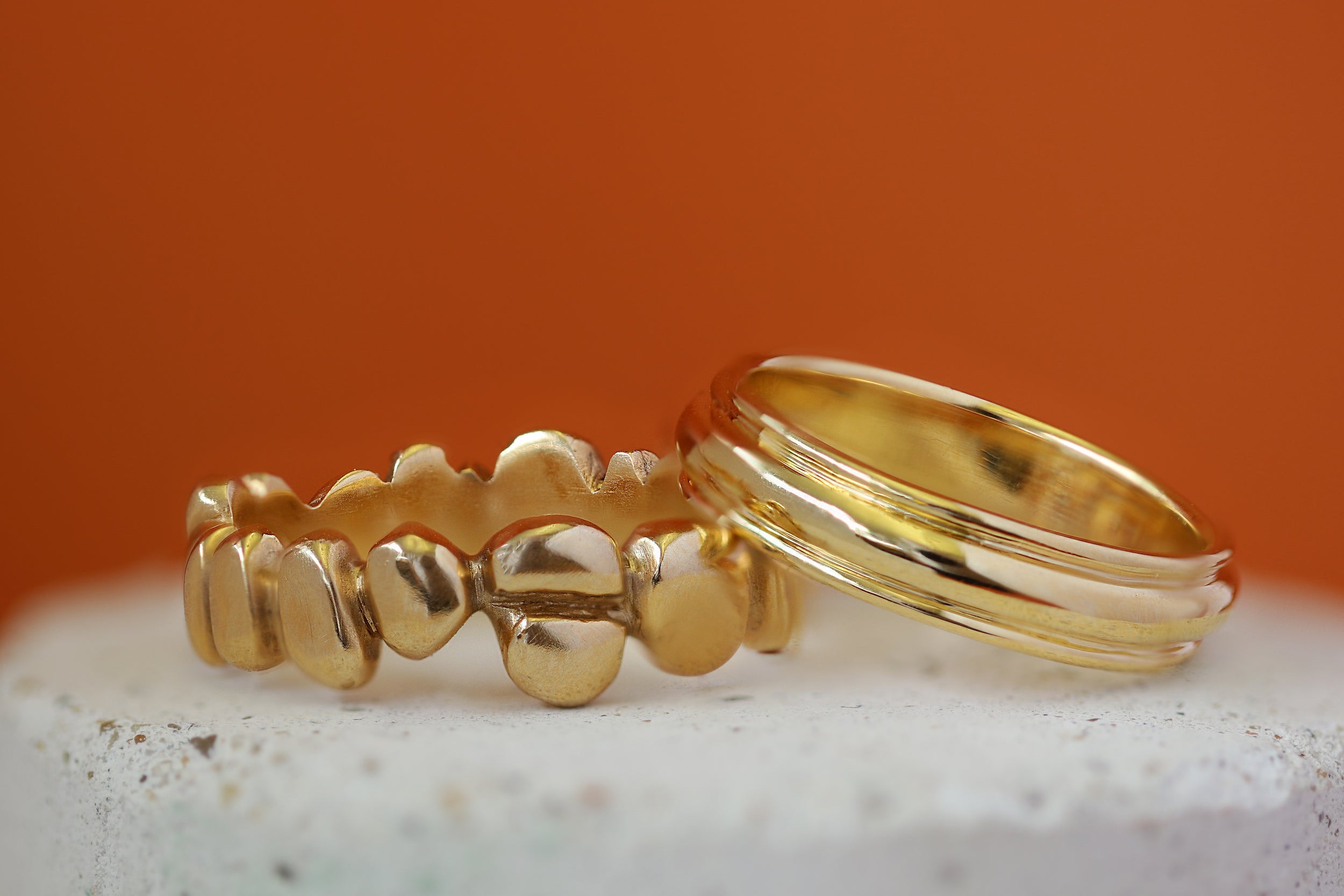 Stacked view of the Ruins Band Wide and Cornice Band Wide / in Yellow Gold by Goldpoint