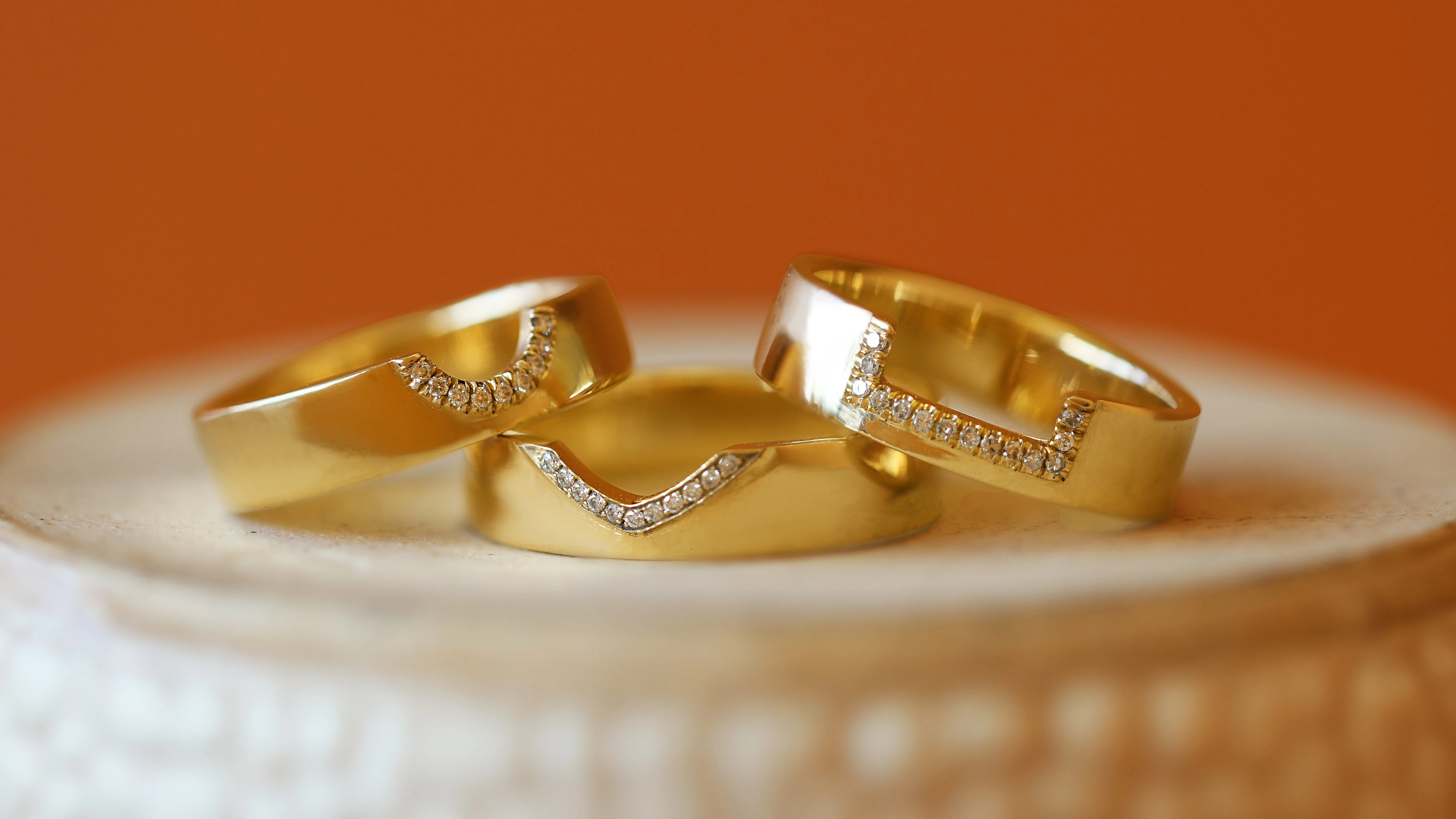 Stacked view of Horizon Band Half Moon Cutout Pave Round Diamonds, Horizon Band Triangle Cutout Pave Round Diamonds, and Horizon Band Rectangle Cutout Pave Round Diamonds
