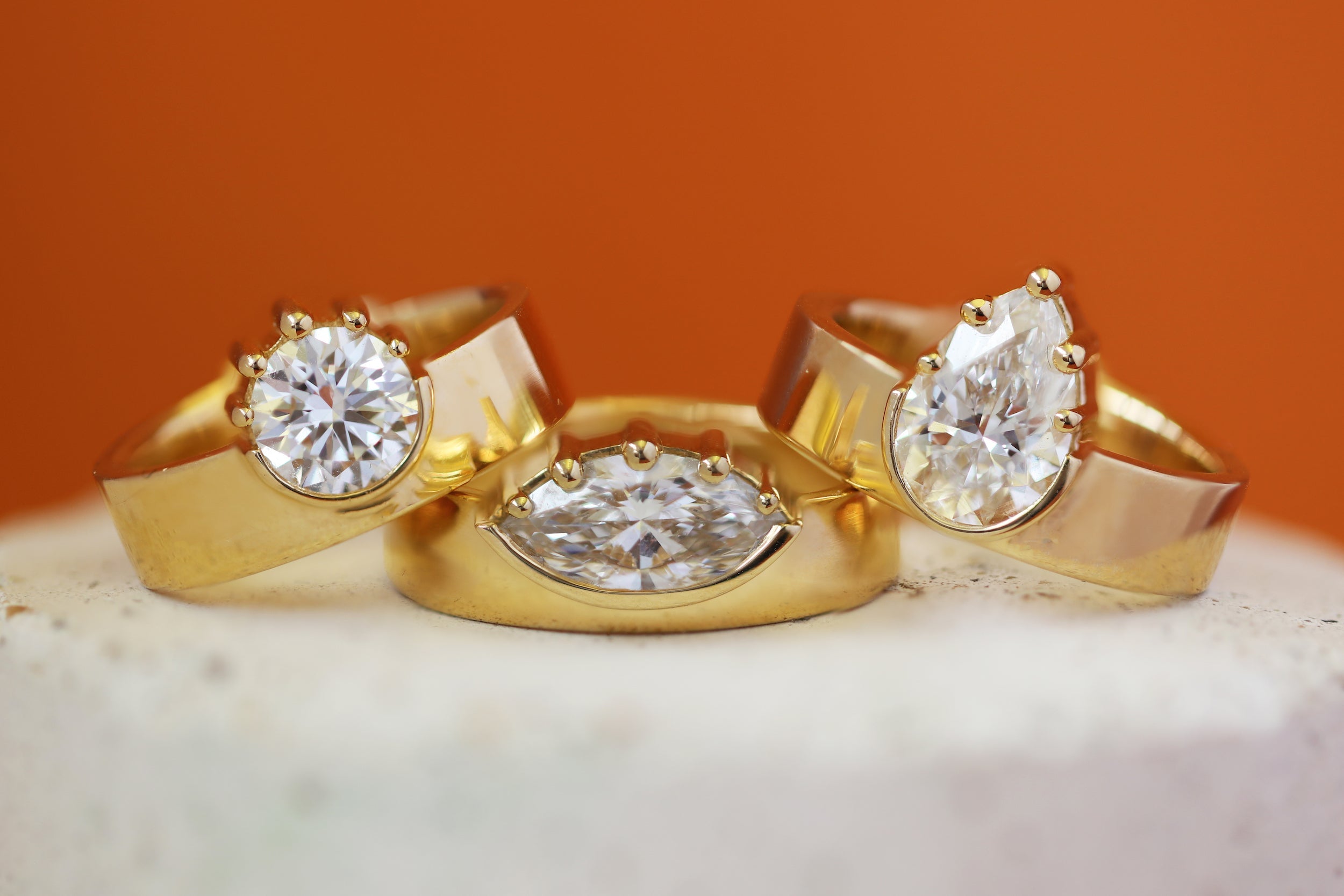 Stacked view of Varick Ring Round Lab Diamond 1ct.  Varick Ring Pear Lab Diamond 1.55ct, and Varick Ring Marquise Lab Diamond 1.22ct by Goldpoint