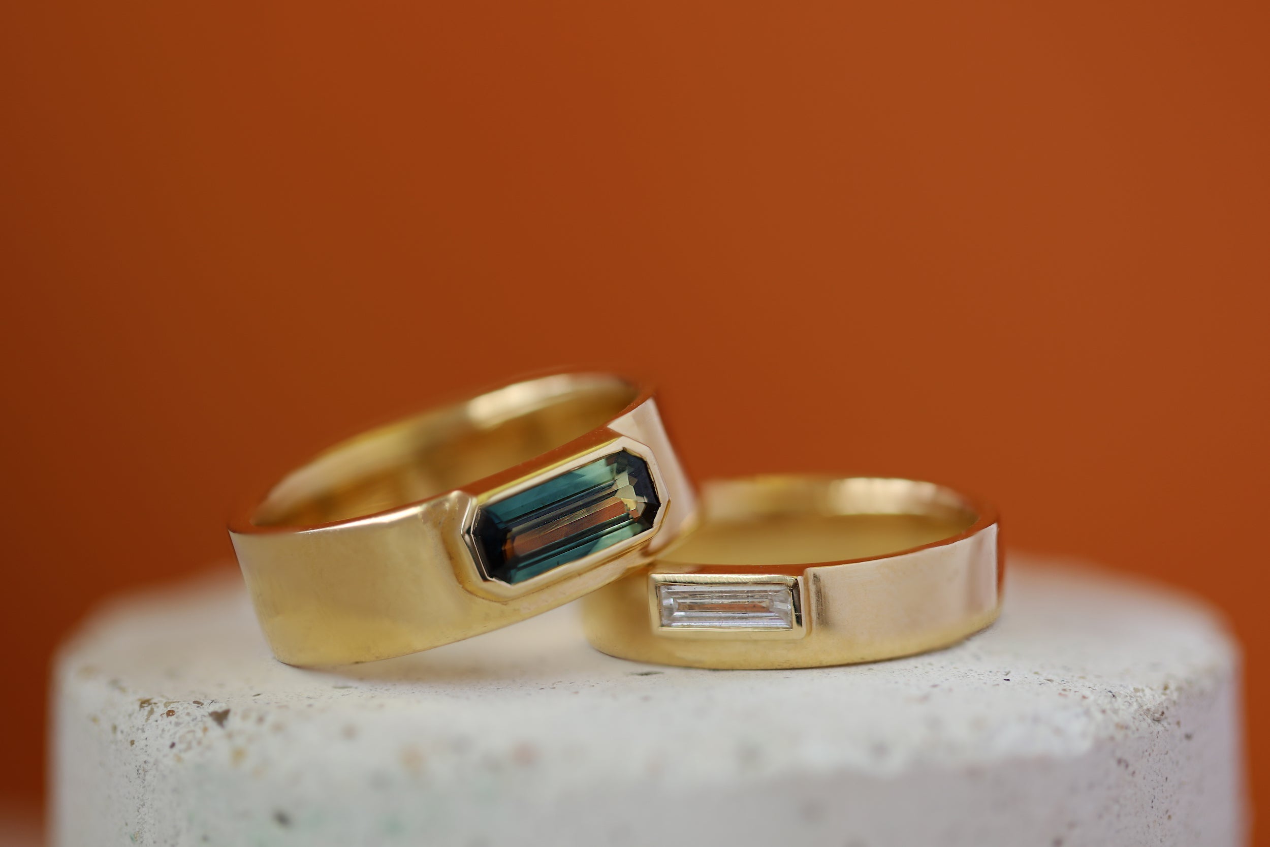 Stacked view of Kingsland Ring Baguette Lab Diamond 0.3ct and Kingsland Ring Emerald Cut Sapphire 1.2ct