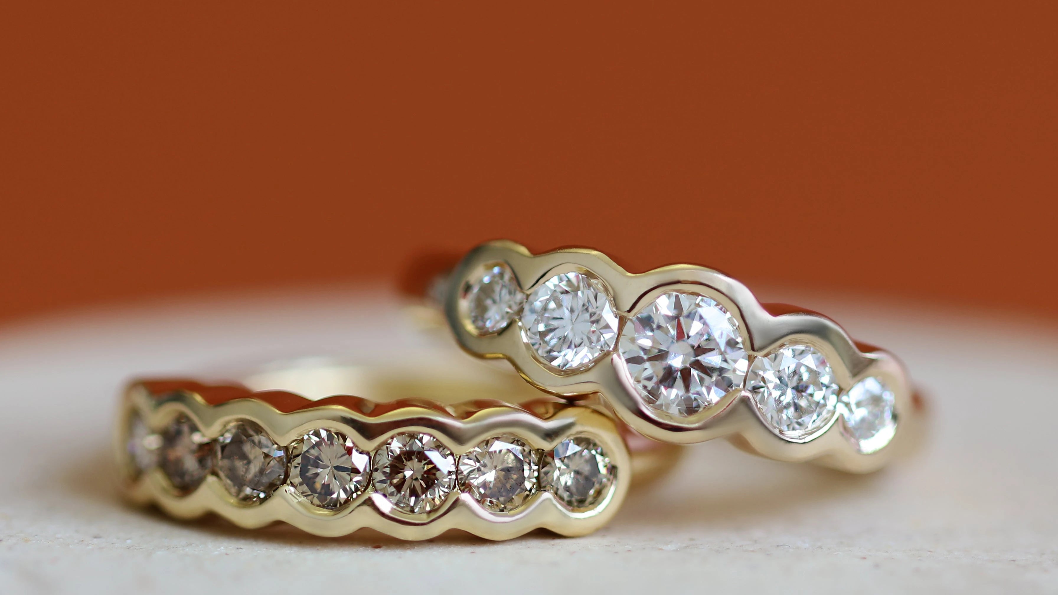 Model wears an abundance of different styles from the Ring collection by Goldpoint