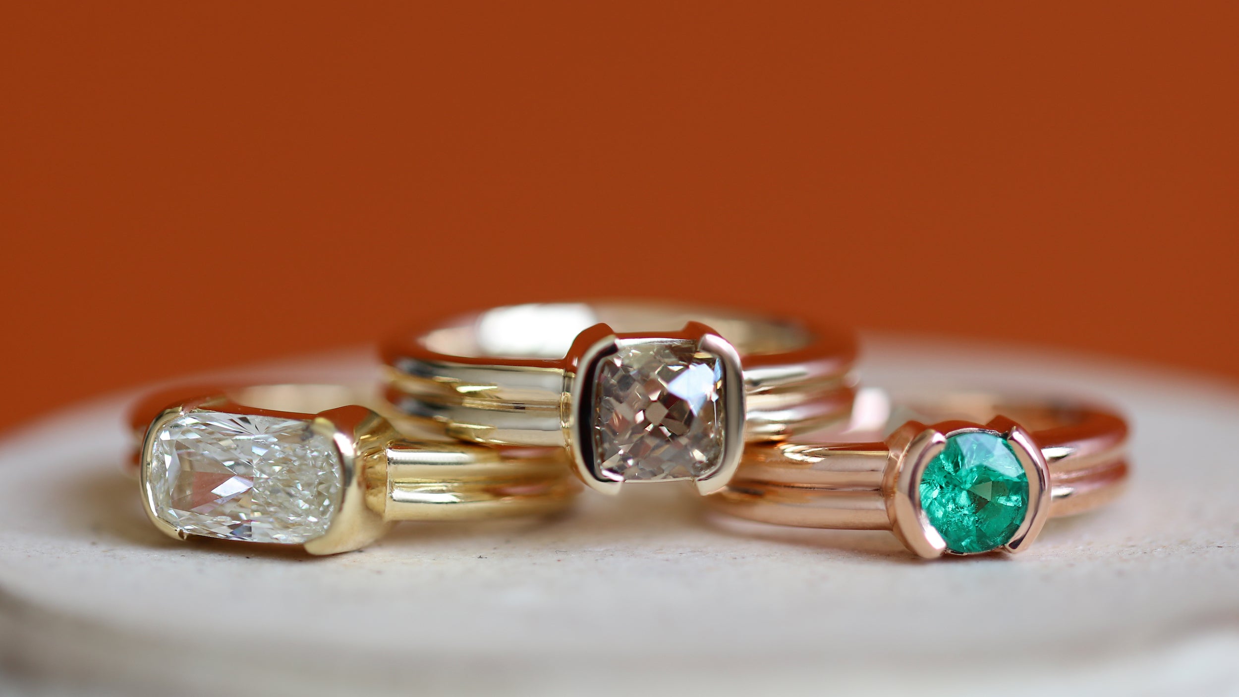 Stacked view of engagement rings from the Franklin Collection