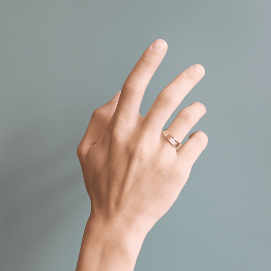 Model wearing Horizon Band / Skinny Baguette Diamond on ring finger