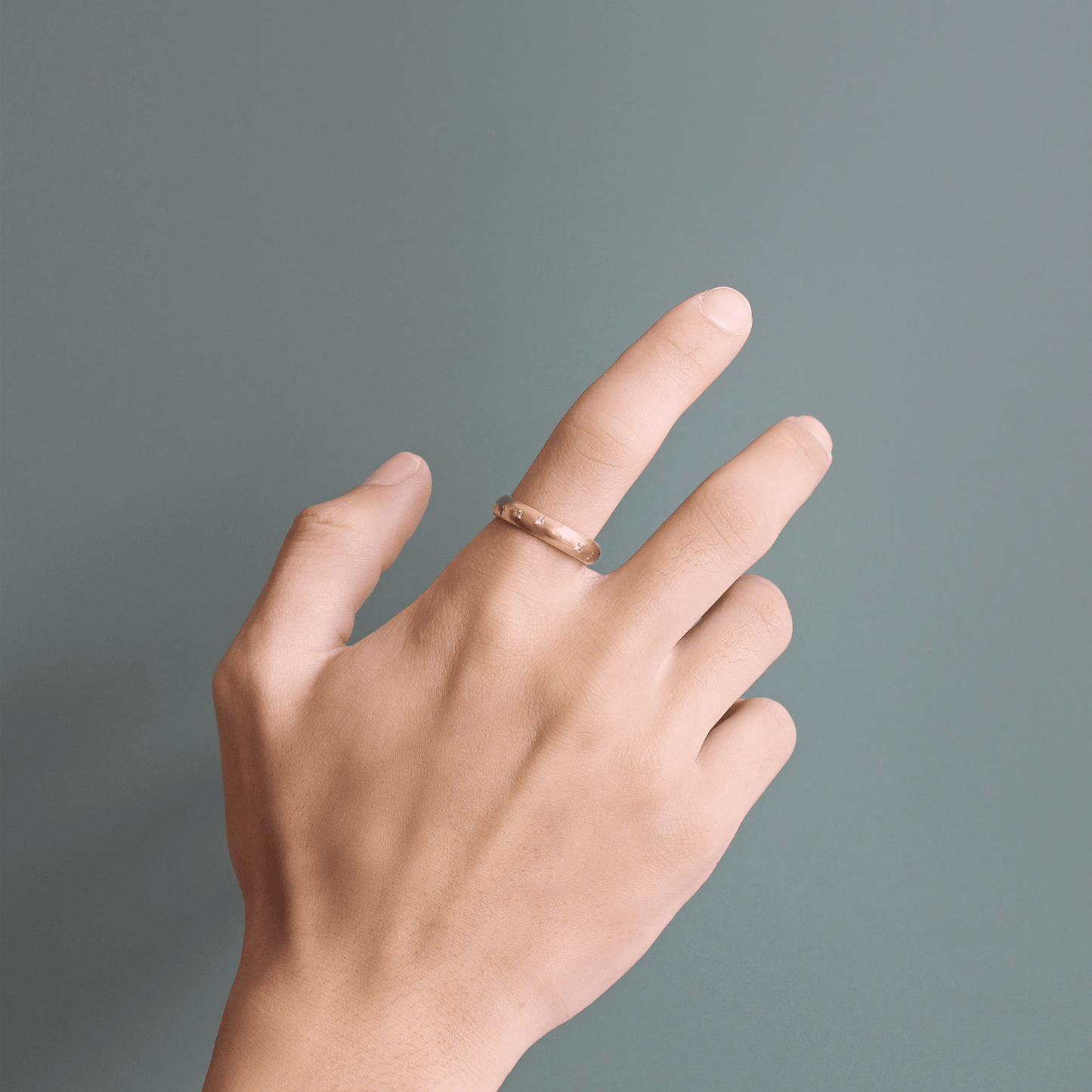 Model wearing Dancing Princess Dome Band / Lab Diamonds on index finger