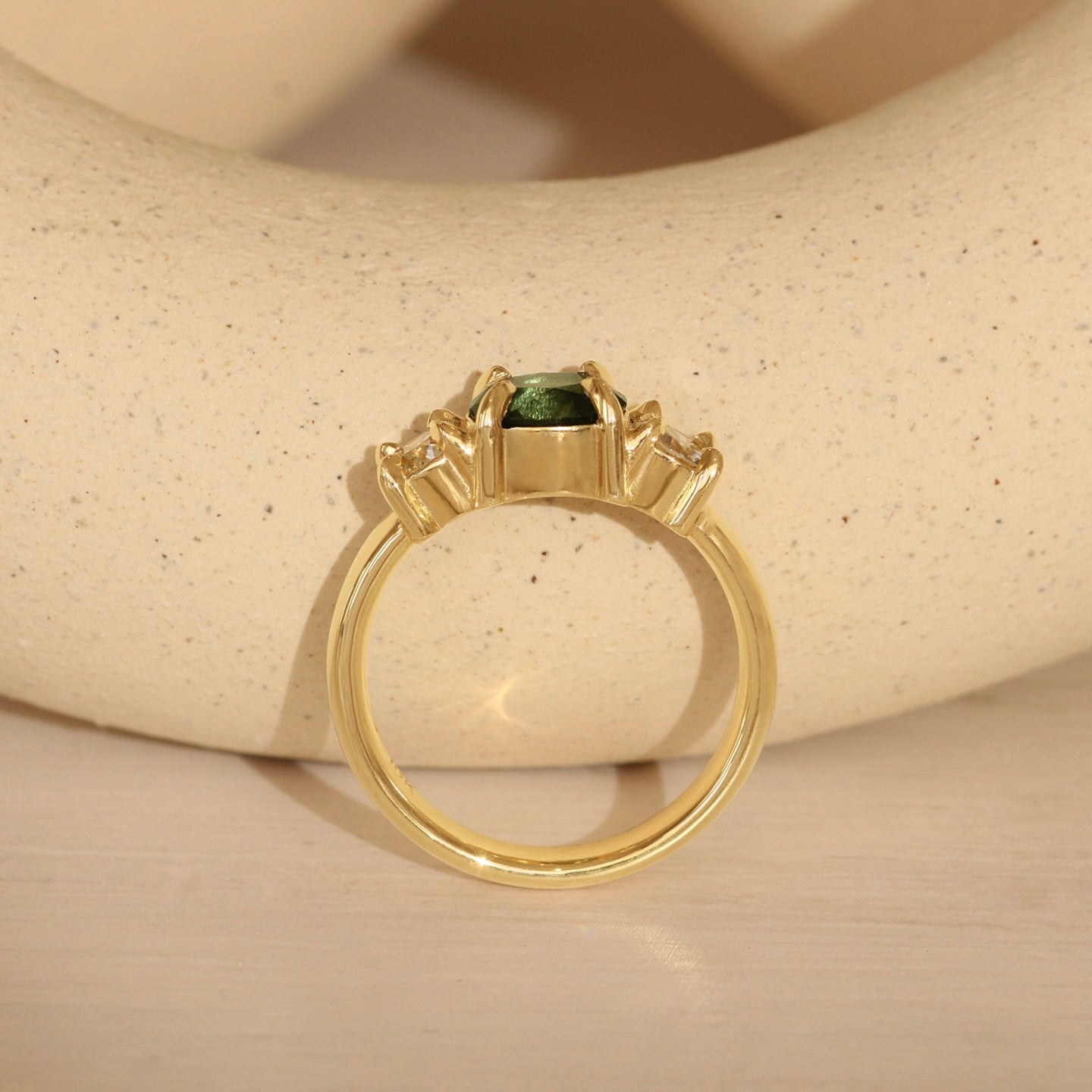 Lifestyle side profile view of Sutton 3 Ring Oval Sapphire 1.63ct by Goldpoint