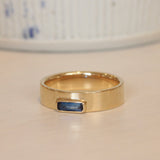 Lifestyle angled view of Kingsland Ring Emerald Cut Sapphire 0.27ct by Goldpoint