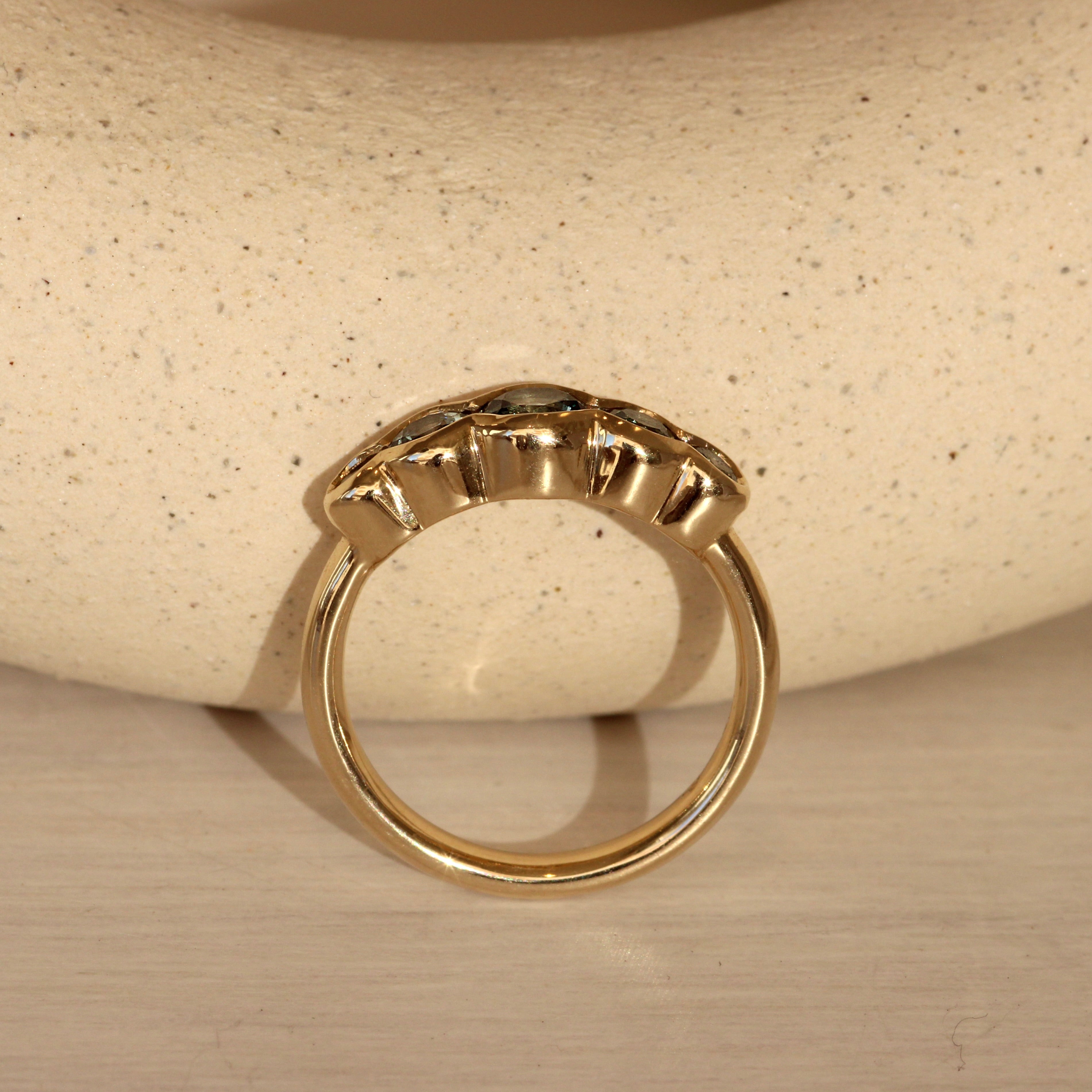 Lifestyle side view of Clay 5 Ring Round Sapphires 0.4ct by Goldpoint