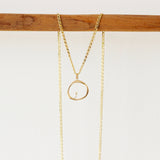 Lifestyle shot of Amorphous Charm / Large Circle + Pearl by Goldpoint