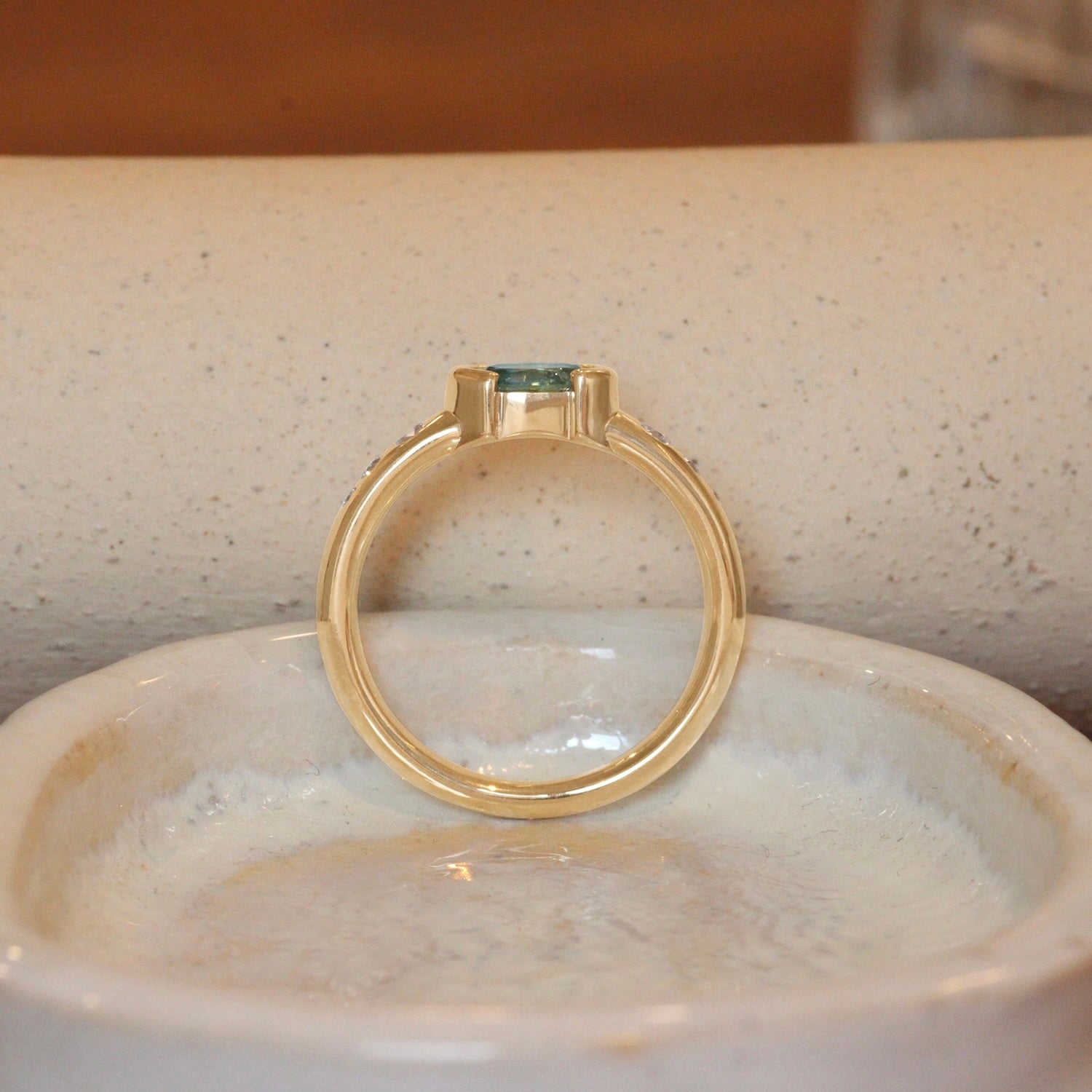 Lifestyle side profile view of Ash Ring Oval Sapphire 0.53ct by Goldpoint Jewelry