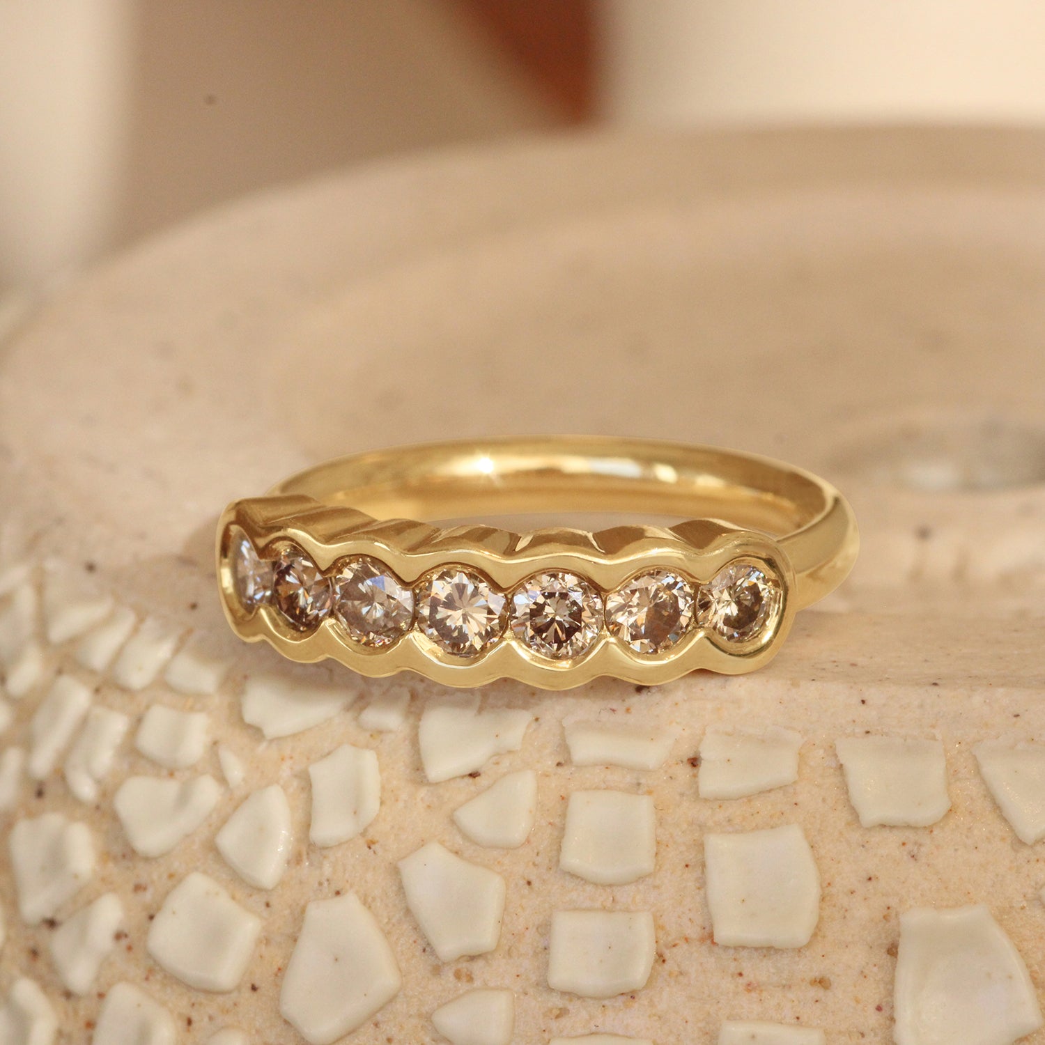 Lifestyle angled view of Cloud 7 Band Round Champagne Diamonds in 18k yellow gold