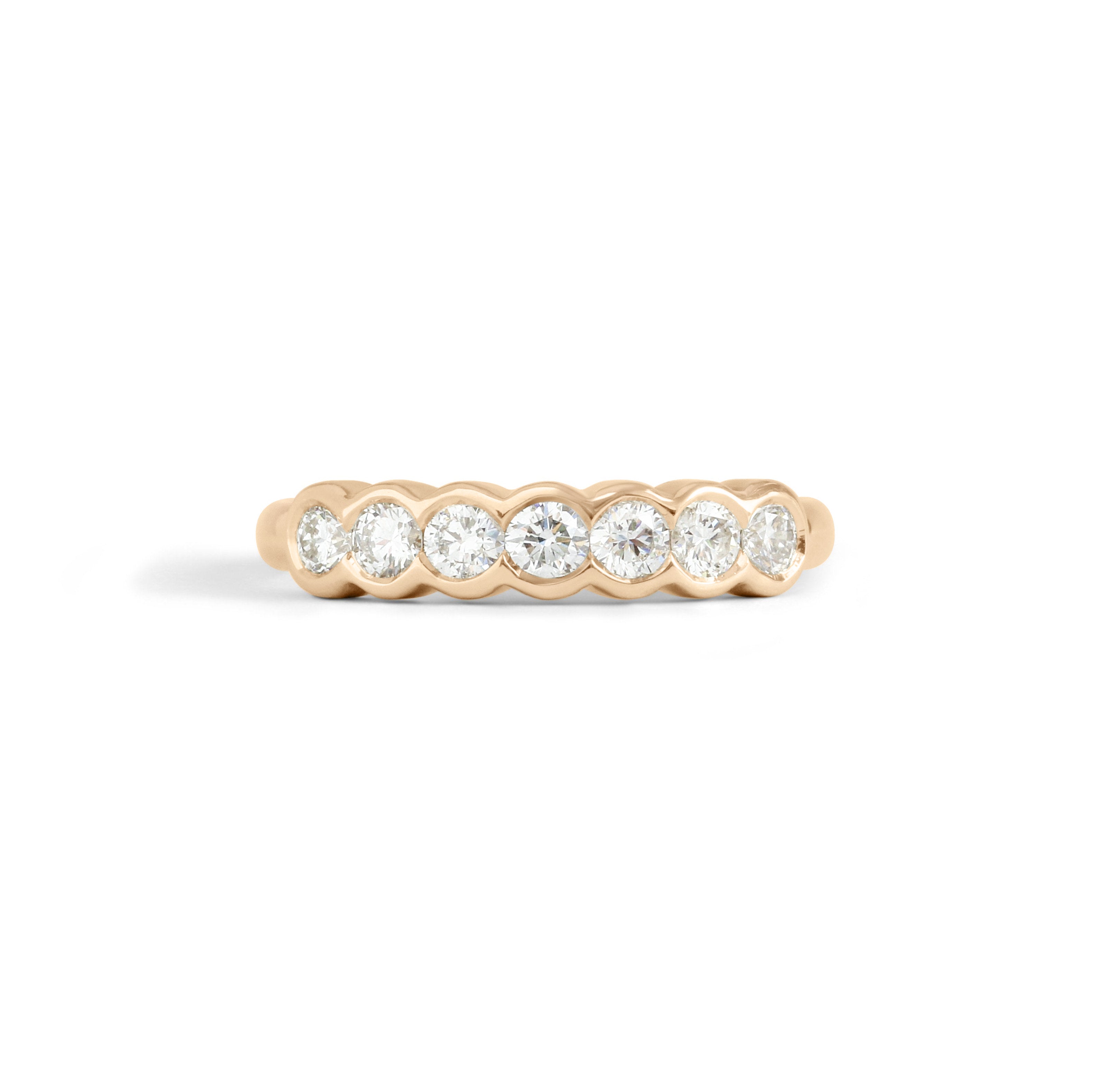 Front view of Cloud 7 Band Round White Diamonds in 14k yellow gold by Goldpoint Jewelry