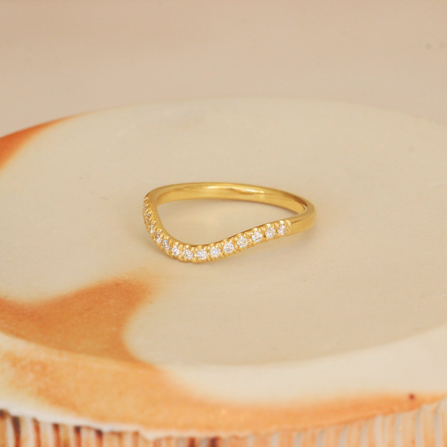 Lifestyle angled view of Flat Band Deep Curve / Pave Round Natural Diamonds  / in 14k Yellow Gold by Goldpoint Jewelry