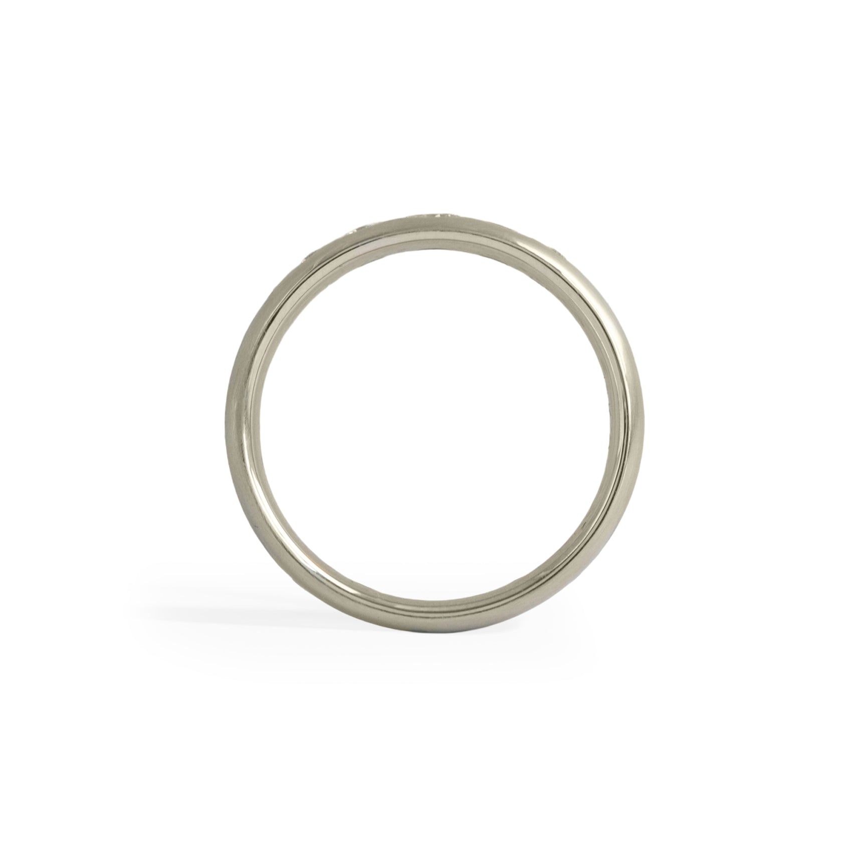 Side profile view of Ellipse Band 5mm / Flush Oval Lab Diamond / in 14k White Gold by Goldpoint Jewelry