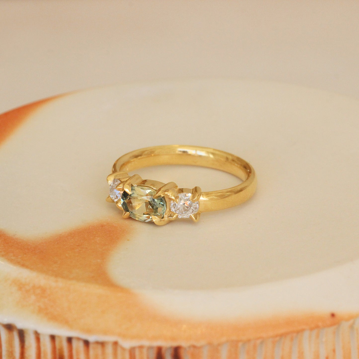 Angled lifestyle side view of Ellipse Ring / Yellow Sapphire Oval + Old Mine Diamonds