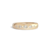Front view of Ellipse Band 5mm / Flush Oval Lab Diamond in 14k Yellow Gold by Goldpoint Jewelry