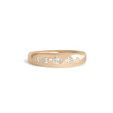 Front view of Ellipse Band 5mm / Flush Oval Diamond / in 14k Yellow Gold by Goldpoint Jewelry