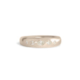 Front view of Ellipse Band 5mm / Flush Oval Diamond / in 14k White Gold by Goldpoint Jewelry