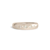 Front view of Ellipse Band 5mm / Flush Oval Diamond / in 18k White Gold by Goldpoint Jewelry