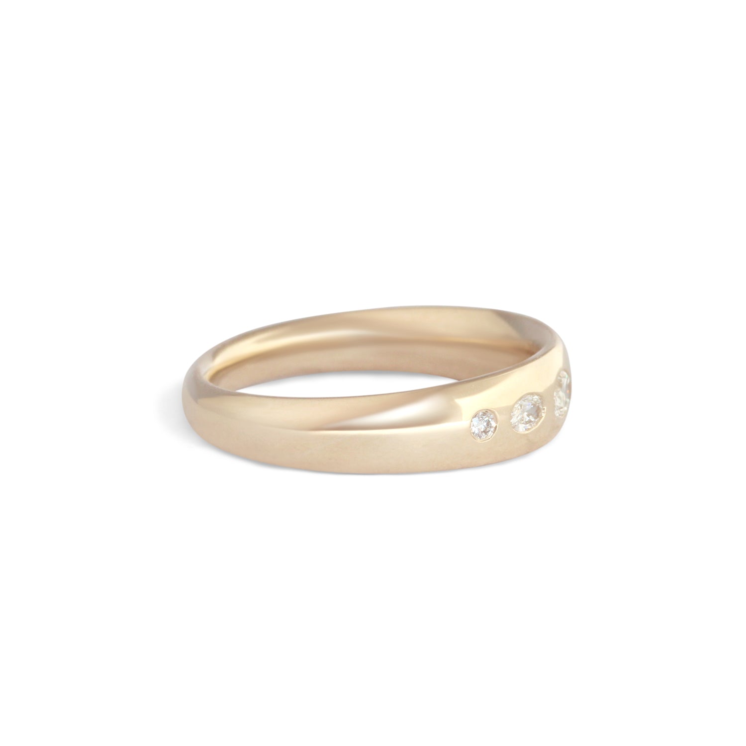 Side view of Ellipse Band 5mm / Flush Oval Lab Diamond in 14k Yellow Gold by Goldpoint Jewelry