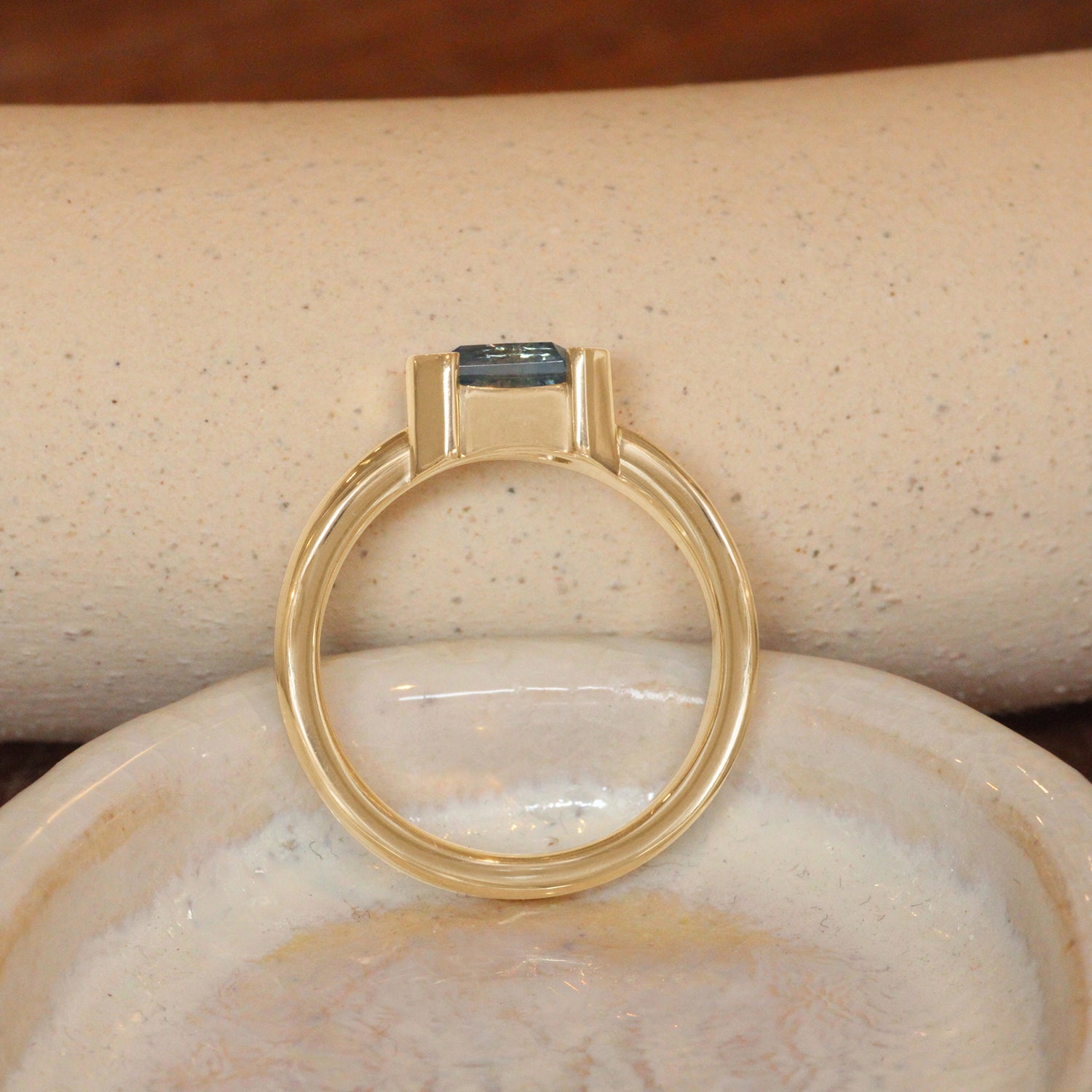 Lifestyle side profile view of Franklin Ring Emerald Cut Sapphire 1.53ct by Goldpoint Jewelry
