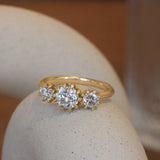 Lifestyle angled view of Grand Trio Milgrain Ring / Natural Old Euro Diamonds 1.04ct by Erin Cuff on a ceramic with a blurred background