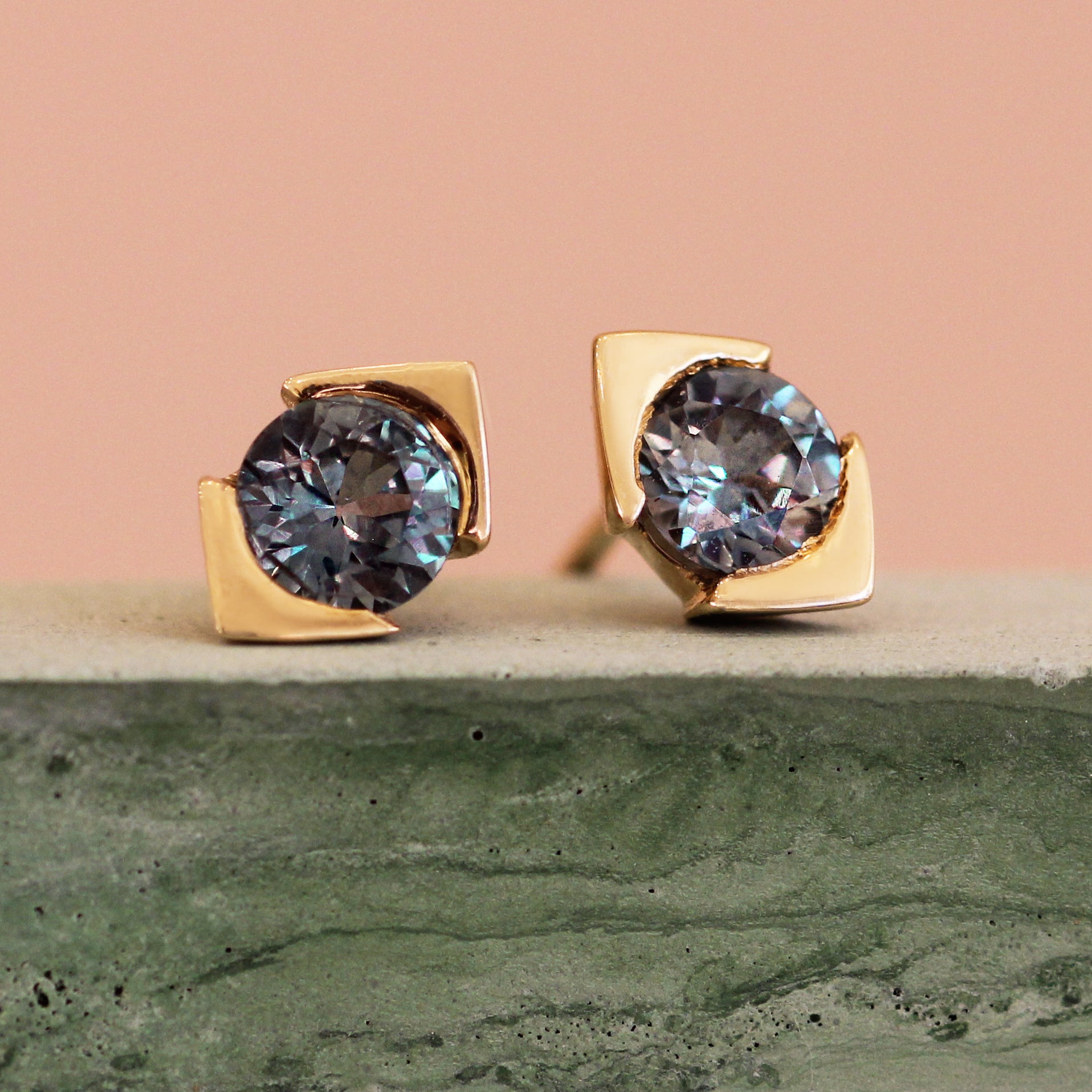 Lifestyle front view of Horus Earring / Bicolor Sapphire by Goldpoint Jewelry