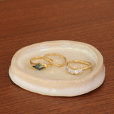 Lifestyle group view of Cloud 5 Band Curve  Round Lab Diamonds in 14k yellow gold with other rings by Goldpoint