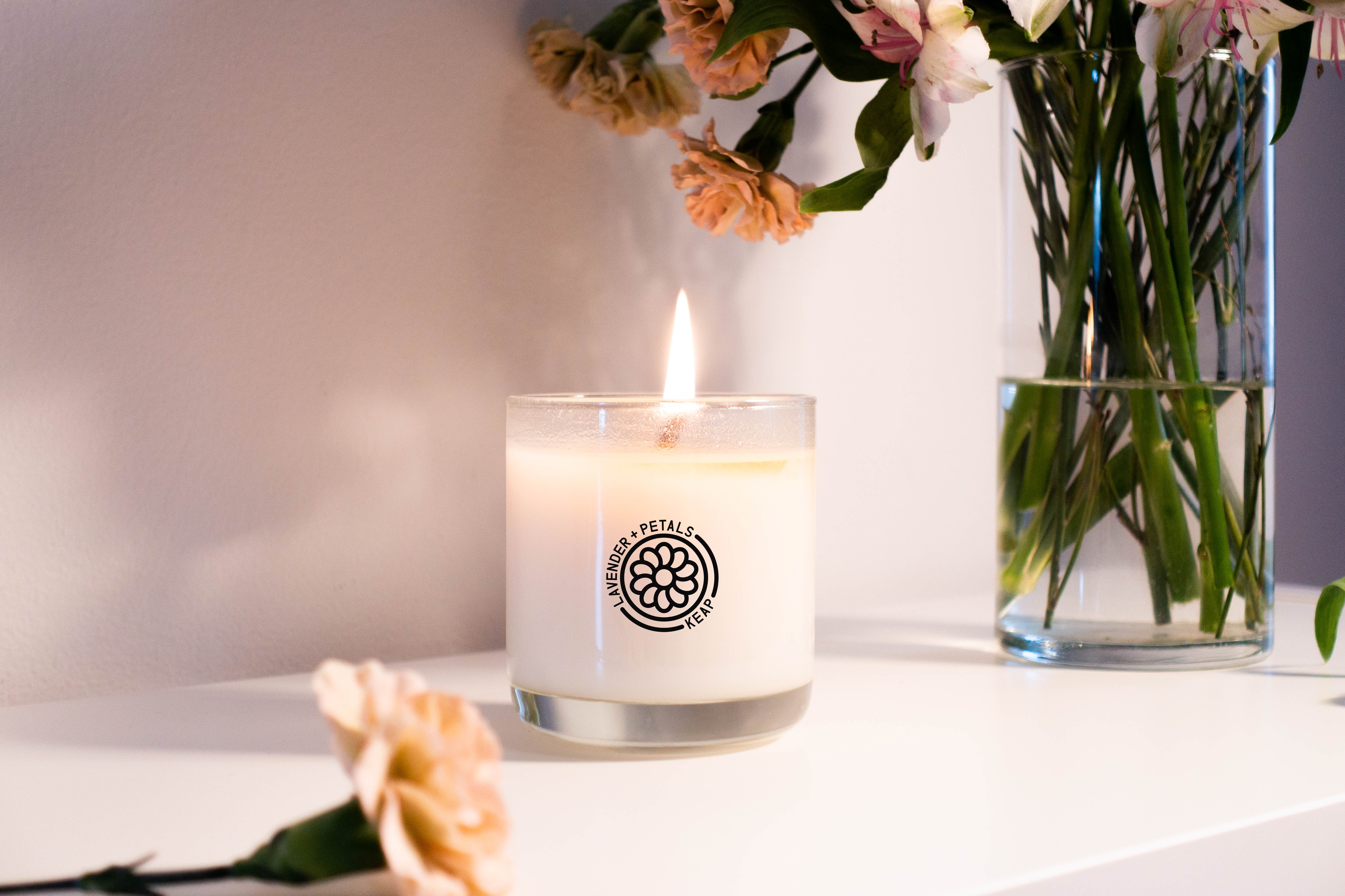 Lifestyle shot of Lavender + Petals Scented Candle burning