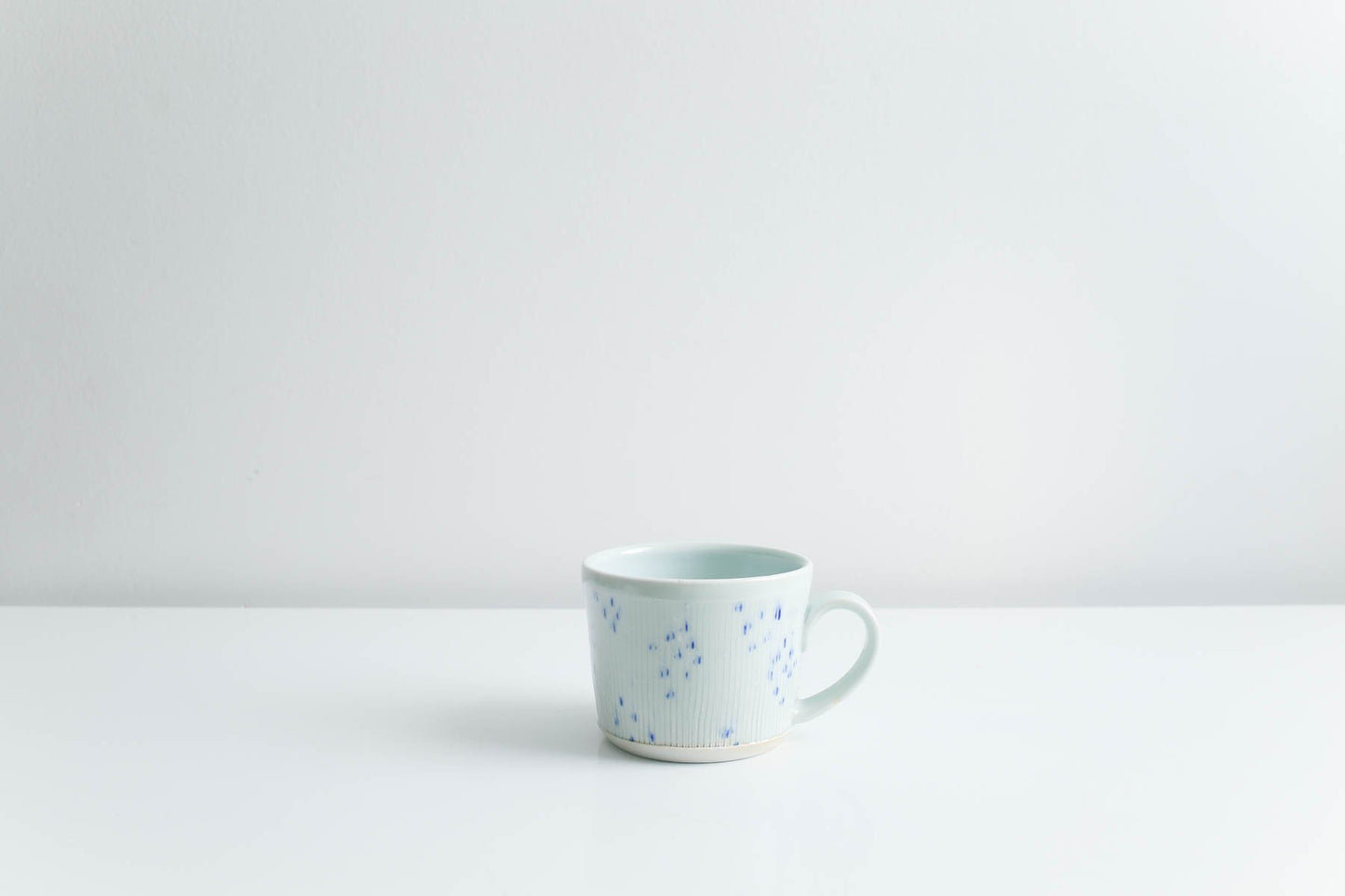 Mug with Blue Dots in Glossy Celadon