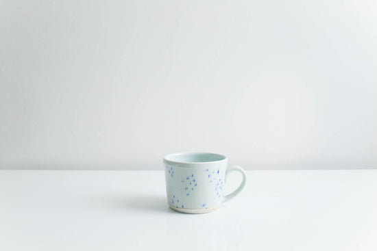 Load image into Gallery viewer, Mug with Blue Dots in Glossy Celadon
