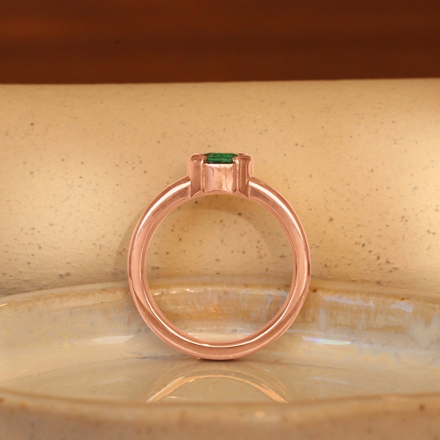 Lifestyle side profile view of Franklin Ring Round Emerald 0.5ct by Goldpoint Jewelry