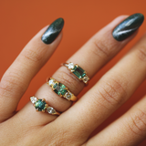 Model wears Wythe Ring Round Sapphire 1.5ct with other engagement rings by Goldpoint