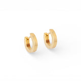 Angled side view of Solid Huggie Hoops by Mon Pilar