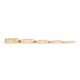 Lined up view of 14k Yellow Gold Dome Bands in various widths 