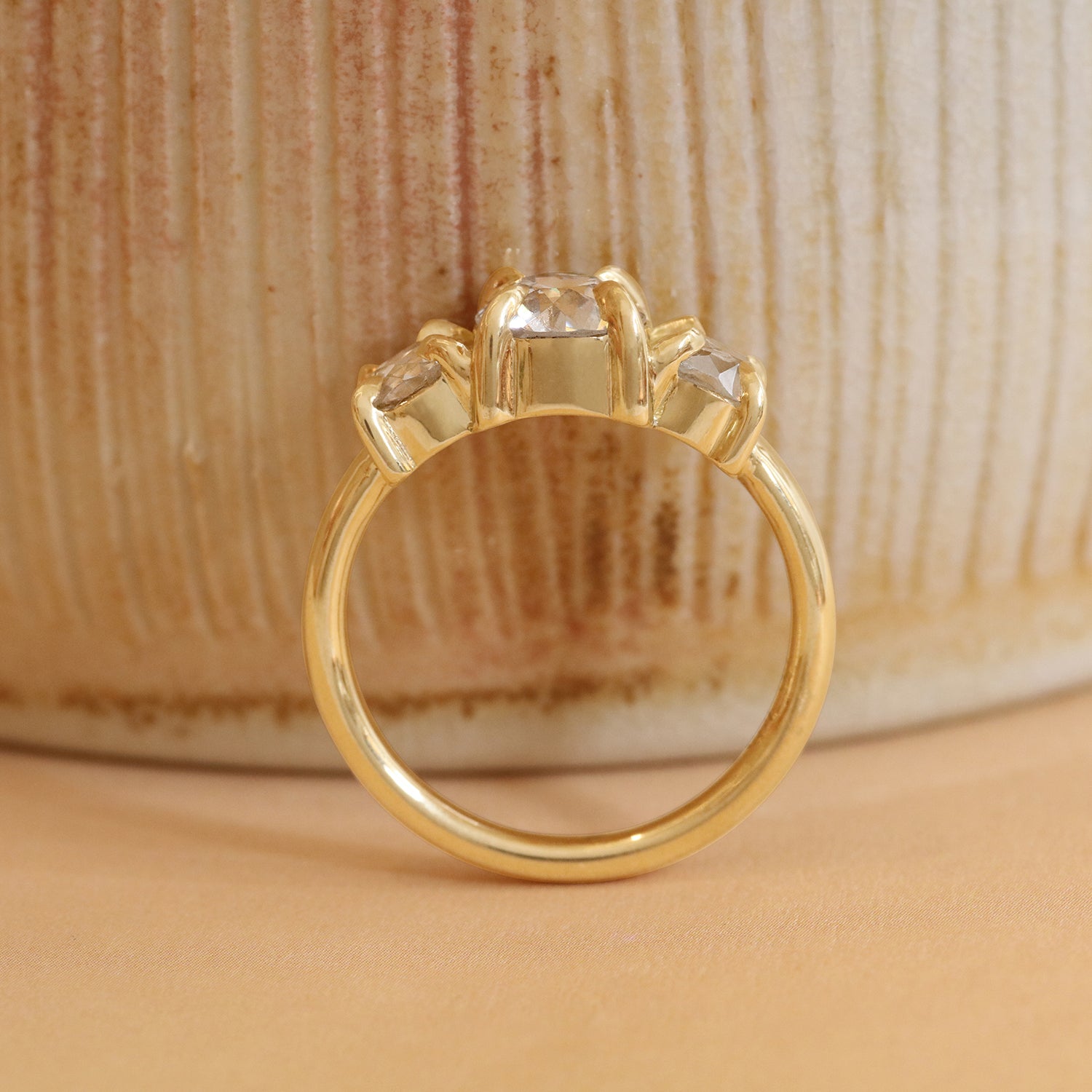 Lifestyle side profile view of Sutton 3 Ring Old Euro Diamond 1.11ct by Goldpoint Jewelry on a ceramic