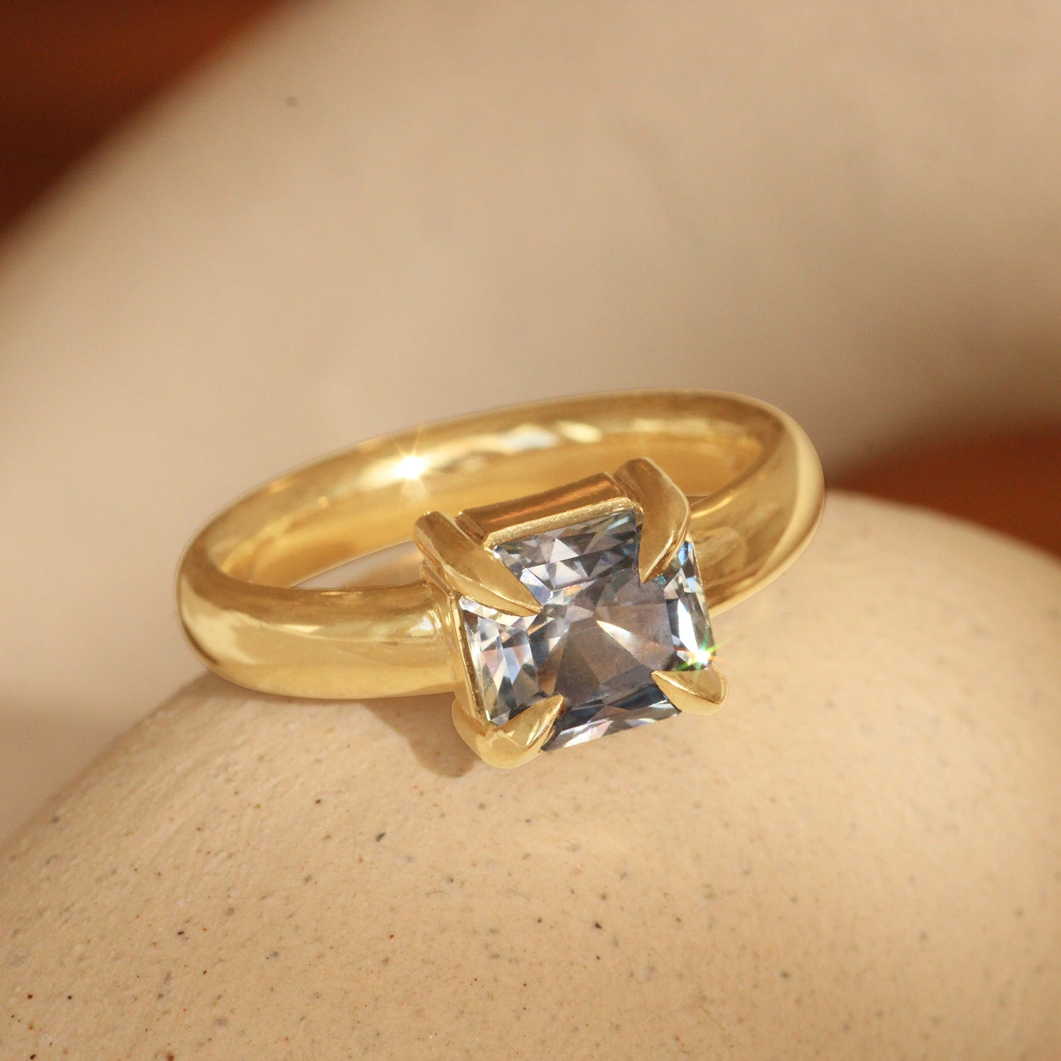 Lifestyle angled view of Sutton Ring Emerald Cut Sapphire 2.1ct by Goldpoint Jewelry