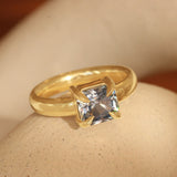 Lifestyle angled view of Sutton Ring Emerald Cut Sapphire 2.1ct by Goldpoint Jewelry