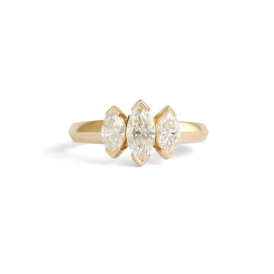Triptych / marquise Diamond engagement ring promoting our Engagement collection.