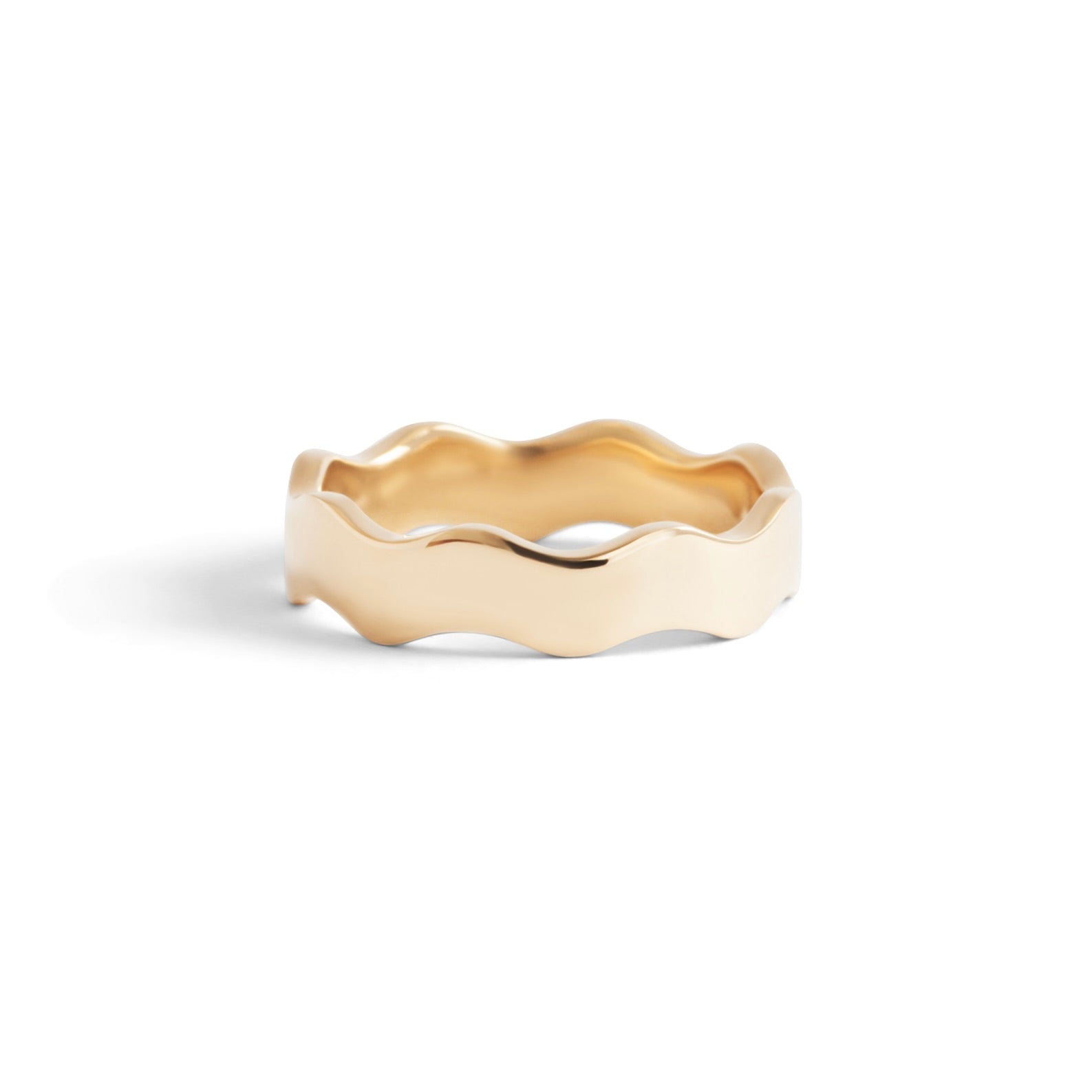 Side view of Waves Wide Band in 14k yellow gold by Goldpoint Jewelry
