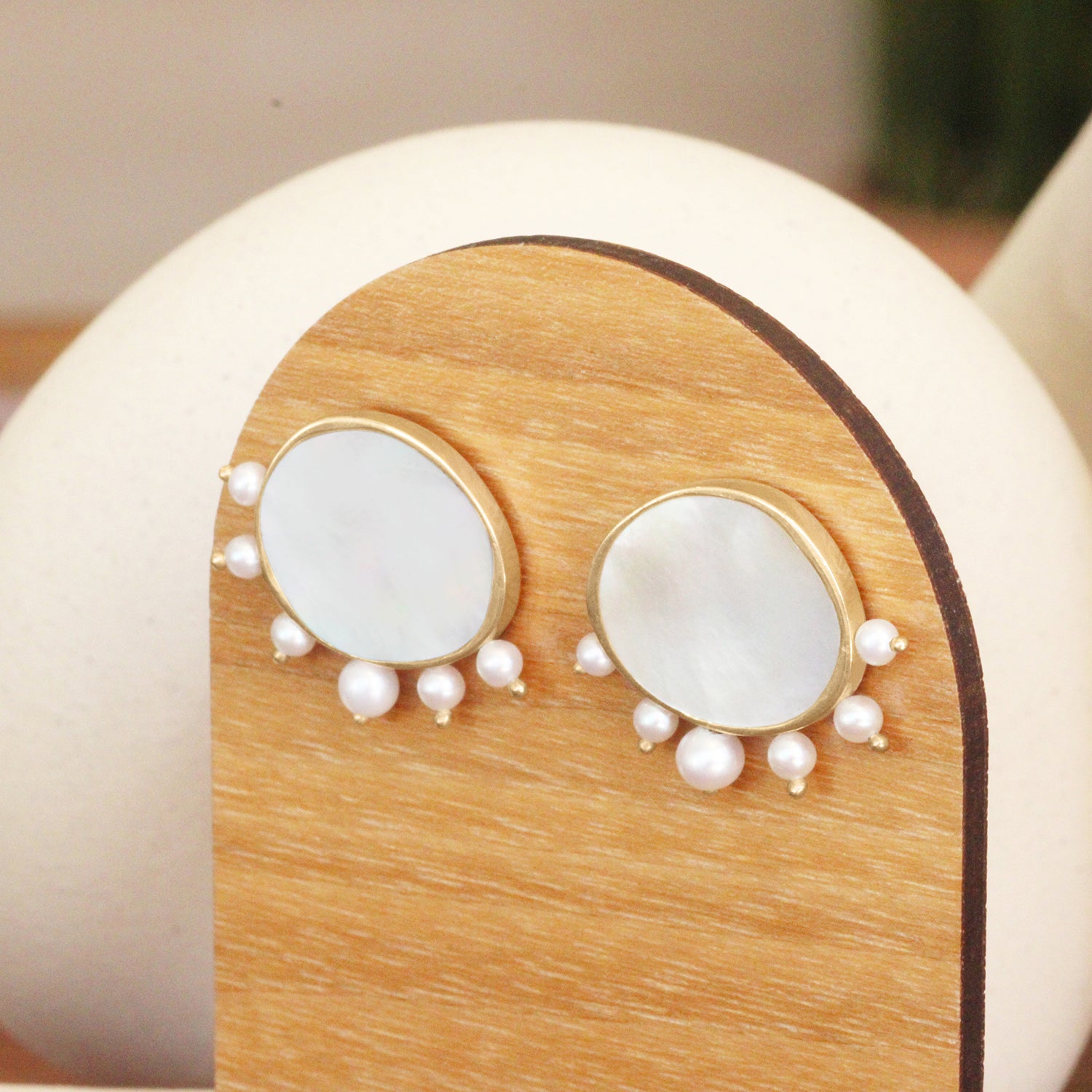 Lifestyle angled view of Amorphous Pearl Inlay Bead Earrings by Goldpoint Jewelry