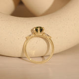 Lifestyle side profile view of Wythe Ring Round Sapphire 1.5ct with other engagement rings by Goldpoint