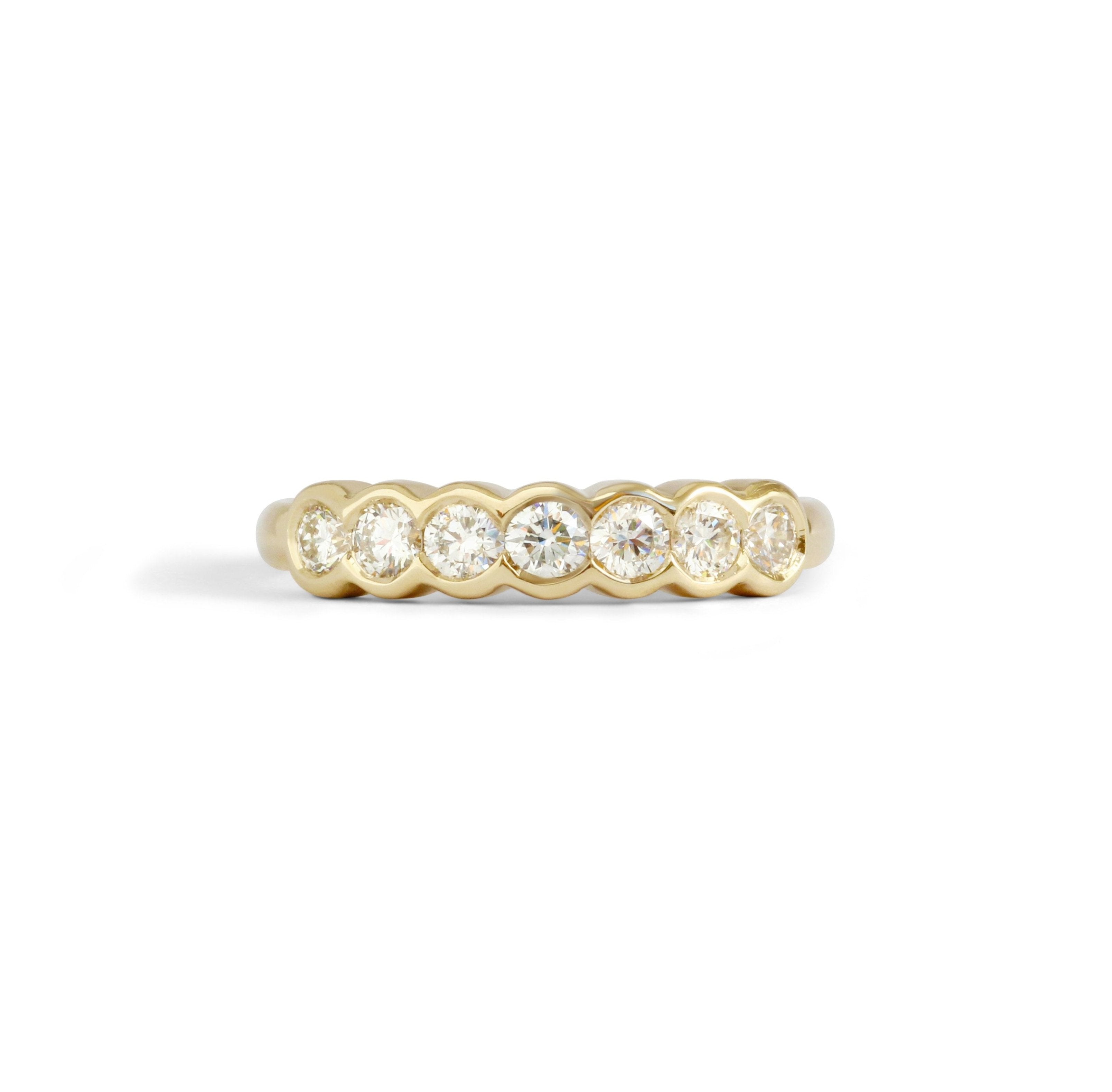 Front view of Cloud 7 Band Round White Diamonds in 14k yellow gold