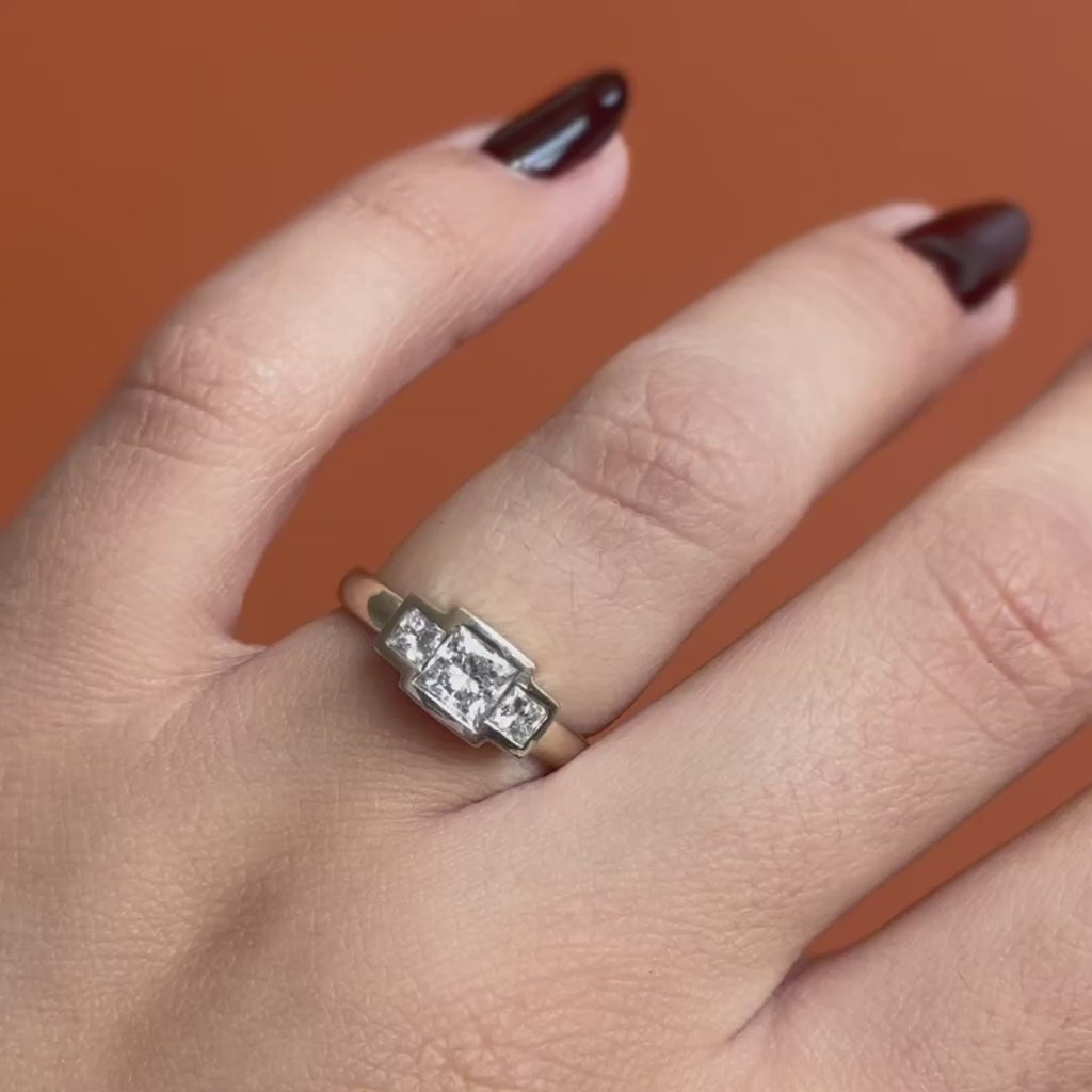 Model wears Clay 3 Ring Princess Cut Lab Diamond 0.81ct by Goldpoint Jewelry on ring finger while showing different angles over an orange backdrop