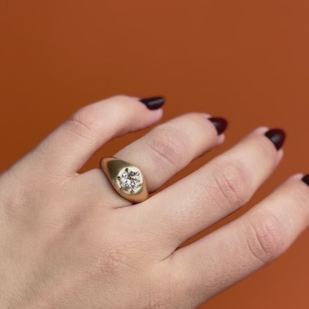 Model wears Leonard 6 Ring Old Euro Natural Diamond 1.04ct by Goldpoint Jewelry on ring finger showing different angles over an orange backdrop